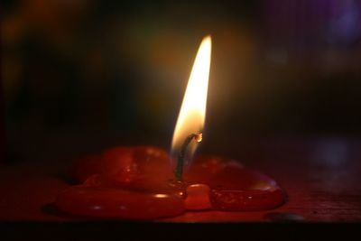 Close-up of lit tea light candle