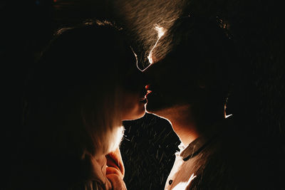 Close-up of couple kissing