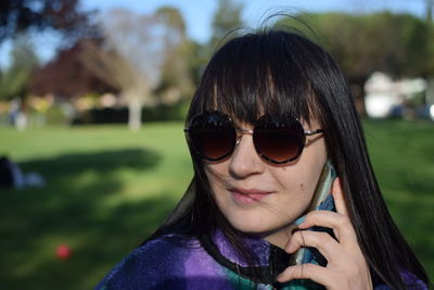 Portrait of woman wearing sunglasses