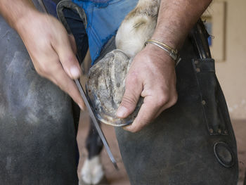 Midsection of man working