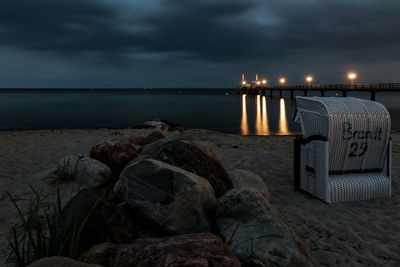 Scenic view of sea against sky at night