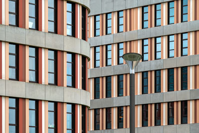 Low angle view of building and streetlight 