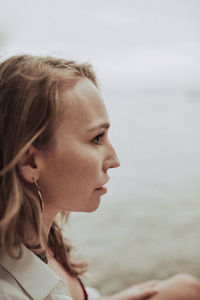 Portrait of young woman looking away