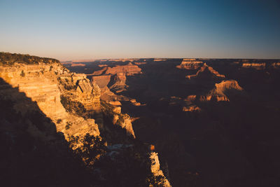 Aerial view of rock formations against sky