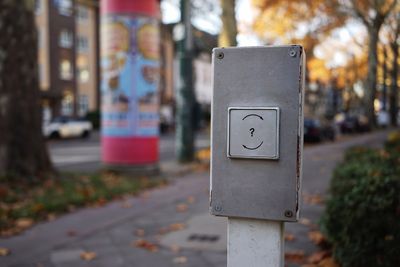 Close-up of question mark sign on mailbox