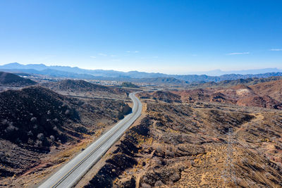 High angle view of road amidst landscape against sky