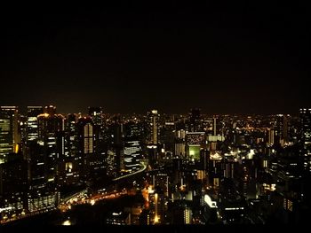 Illuminated cityscape at night