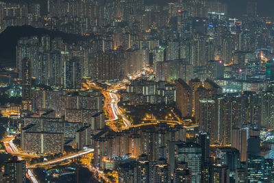 Aerial view of city lit up at night