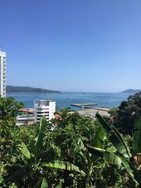 Scenic view of sea against blue sky
