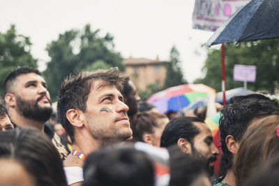 Group of people looking away outdoors