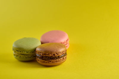 Close-up of dessert against yellow background