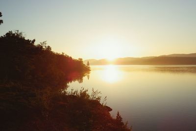 Sunset over calm lake