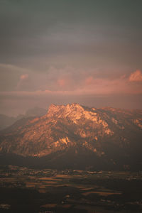 Scenic view of landscape against sky during sunset