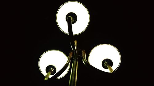 Low angle view of illuminated lamp