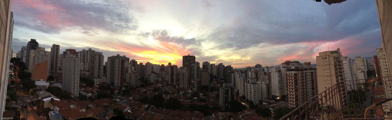 PANORAMIC VIEW OF CITY BUILDINGS AGAINST SKY