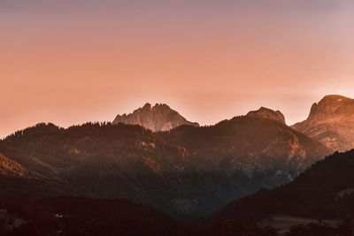 Scenic view of mountains against sky during sunset