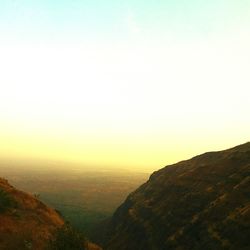 Scenic view of landscape at sunset