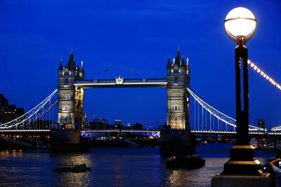 View of suspension bridge at night