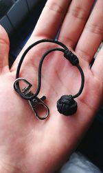 Close-up of hand holding ring