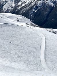 Scenic view of snow covered mountains