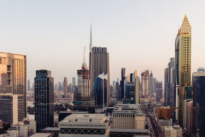 Skyscrapers in city against sky