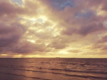 Scenic view of sea against dramatic sky