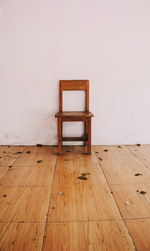 Chair on hardwood floor at home