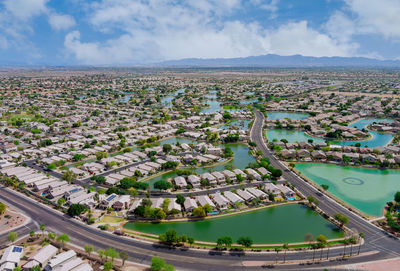 High angle view of river amidst buildings in city