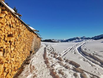 Scenic view of mountain against clear blue sky