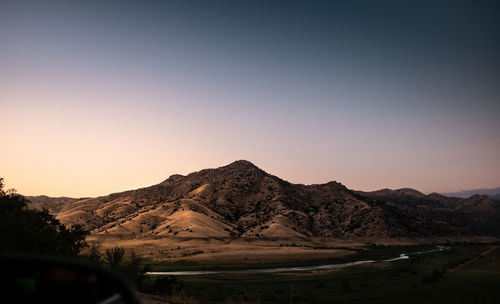 Scenic view of mountains against clear sky