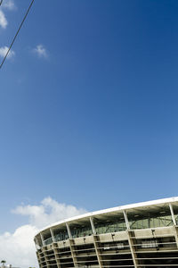 Low angle view of building against blue sky