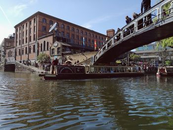 View of bridge over river in city