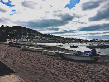 Close-up of beach against sky