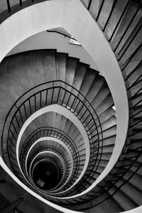 Directly below shot of spiral staircase in building