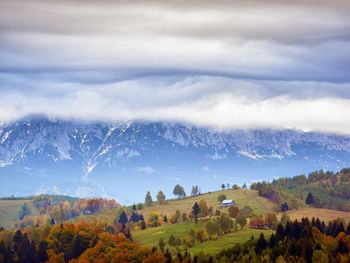 Scenic view of landscape against sky during autumn