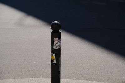 High angle view of traffic sign on road