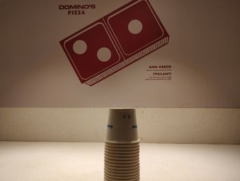 High angle view of text on table against wall