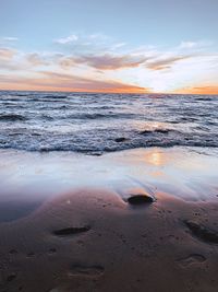 Scenic view of sea against sky during sunset