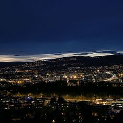 Aerial view of illuminated cityscape