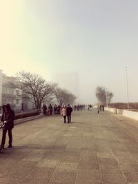 People walking on city street