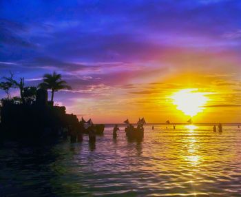 Scenic view of sea at sunset