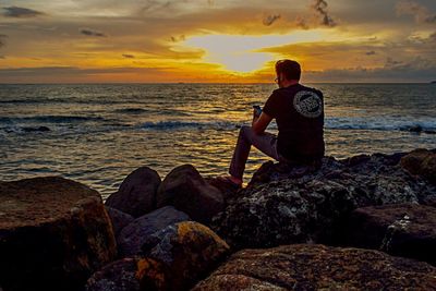 Scenic view of sea at sunset