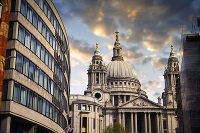 Low angle view of buildings in city against sky