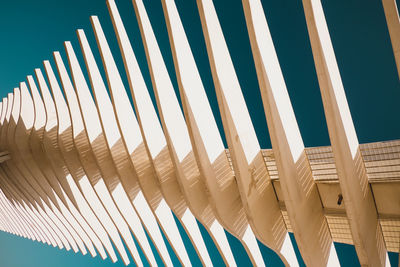 Low angle view of modern building against clear blue sky
