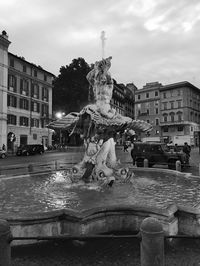 Statue of fountain in city