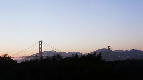 Suspension bridge at sunset