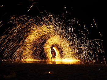 Firework display at night