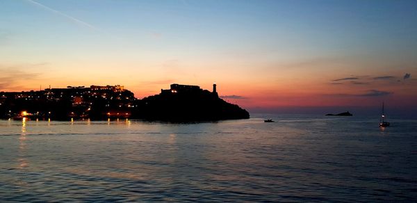 Scenic view of sea against sky during sunset