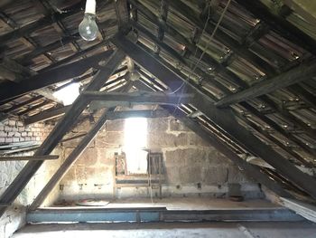 Low angle view of illuminated staircase in building