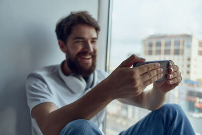 Young man using smart phone